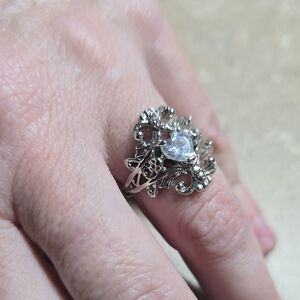 Elegant Silver Heart Ring, Skull Accents